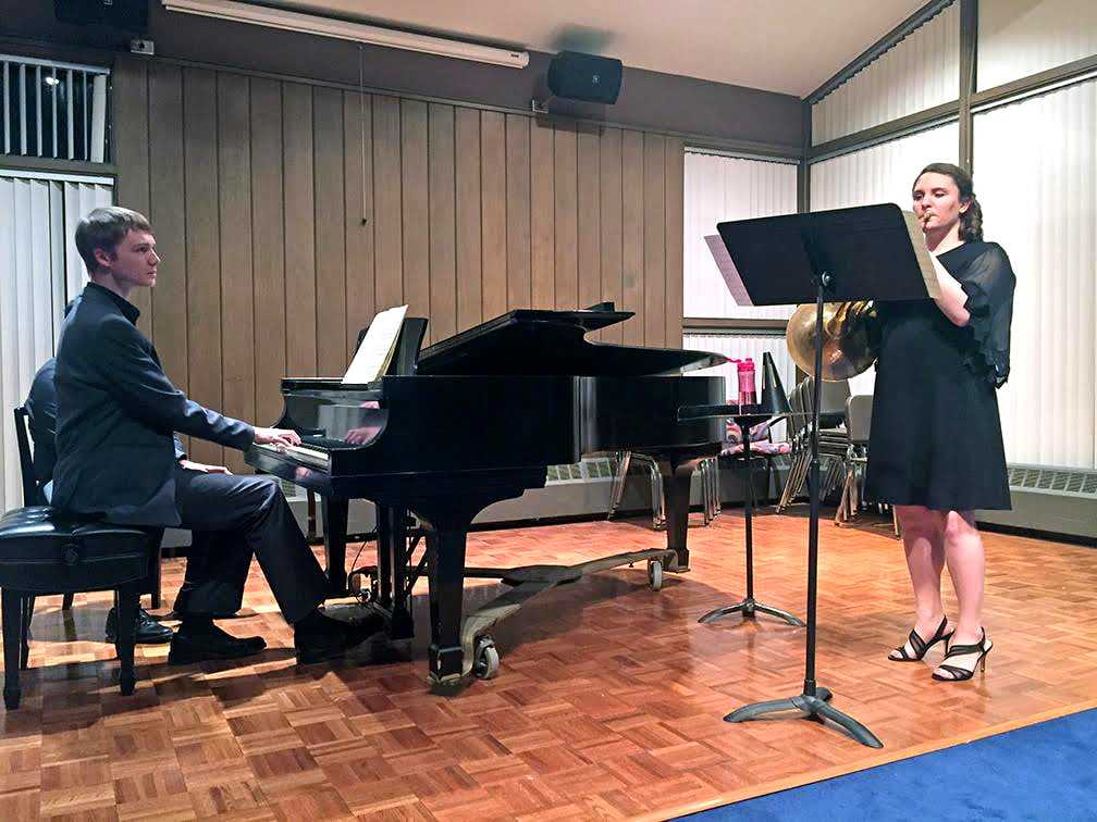 Shane McFadden at piano with French horn soloist
