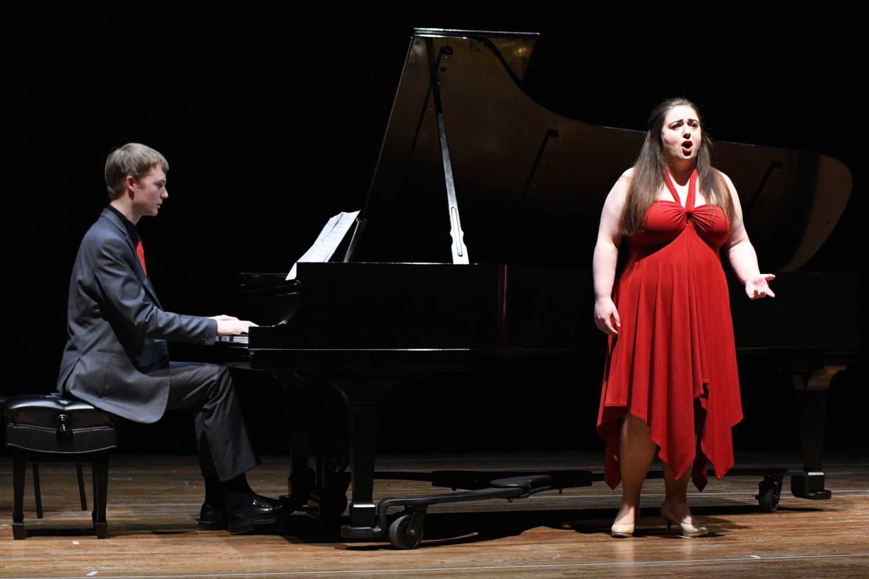 Shane McFadden at piano with singer