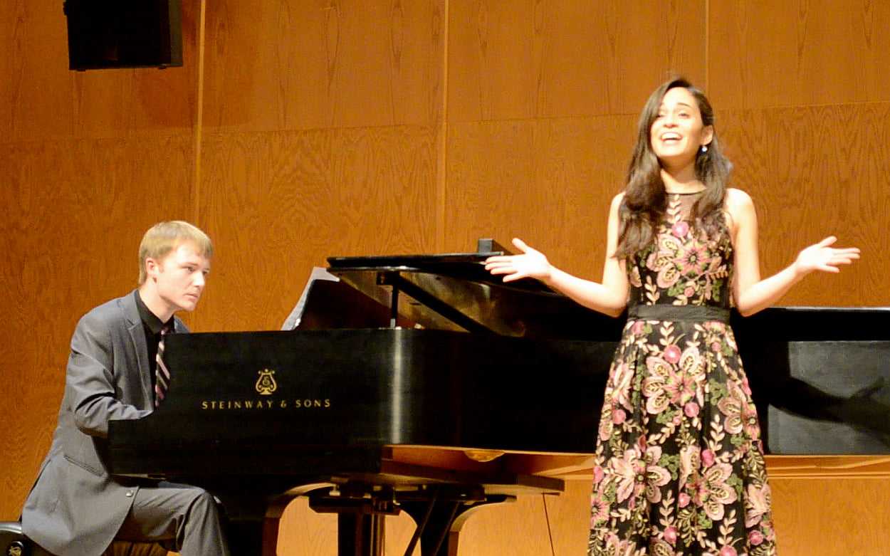 Shane McFadden at piano with singer